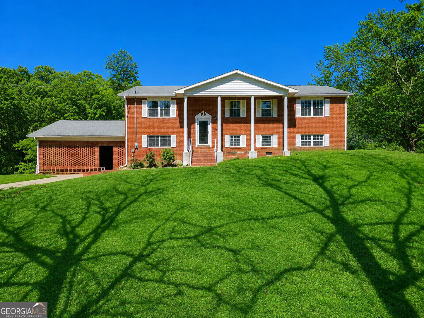 5630 County Road 13, Heflin, AL 36264 — Stately brick home on 3.17 acres