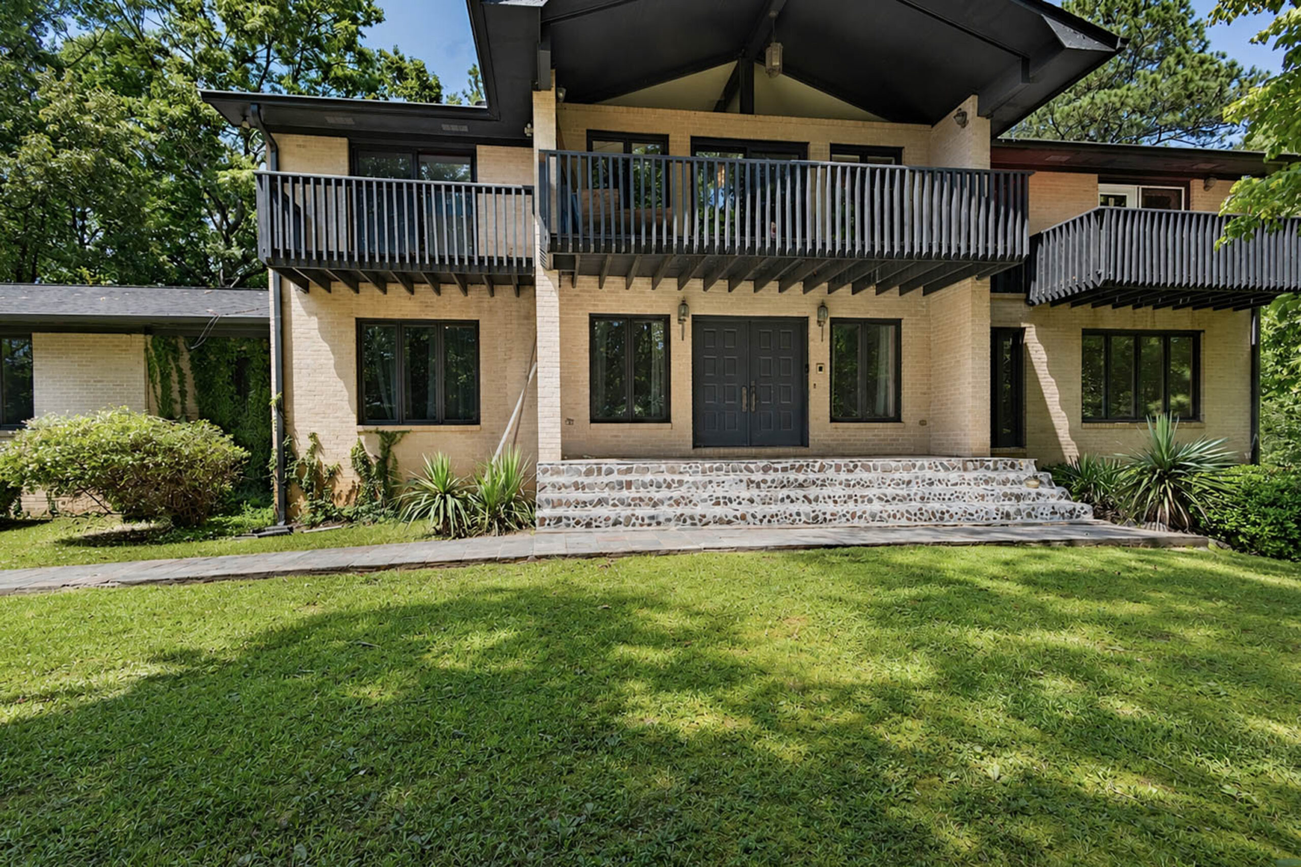 106 Anna Ridge Dr Heflin AL — deck with wooded and lake views