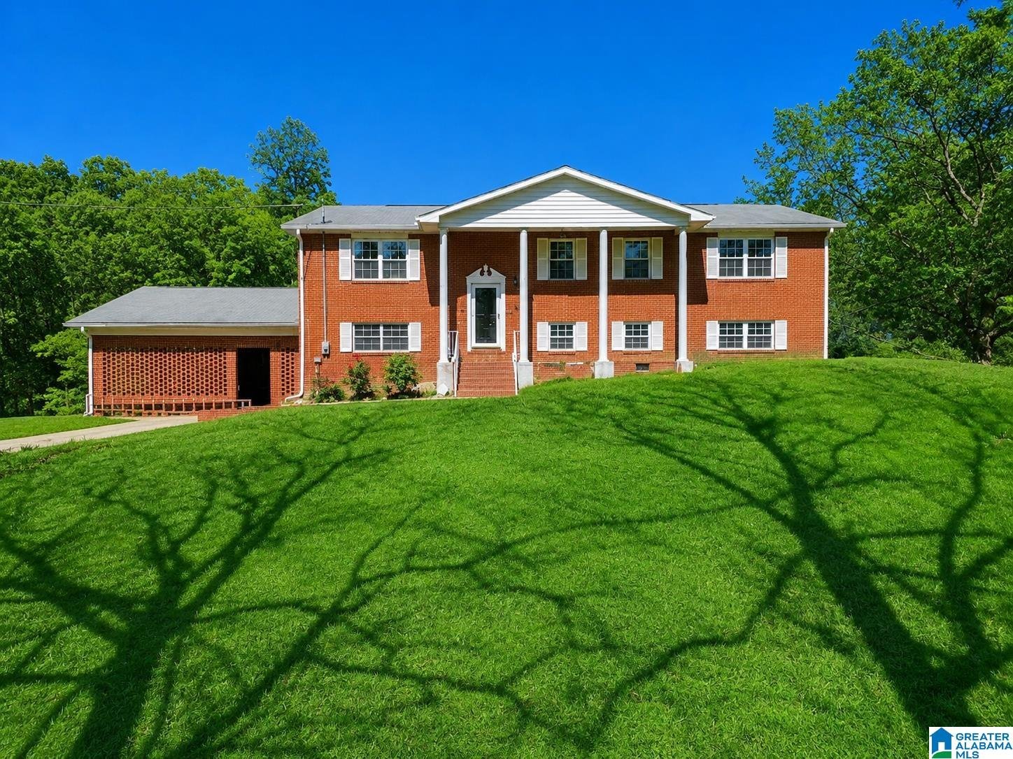 5630 County Road 13, Heflin, AL 36264 — Stately brick home on 3.17 acres