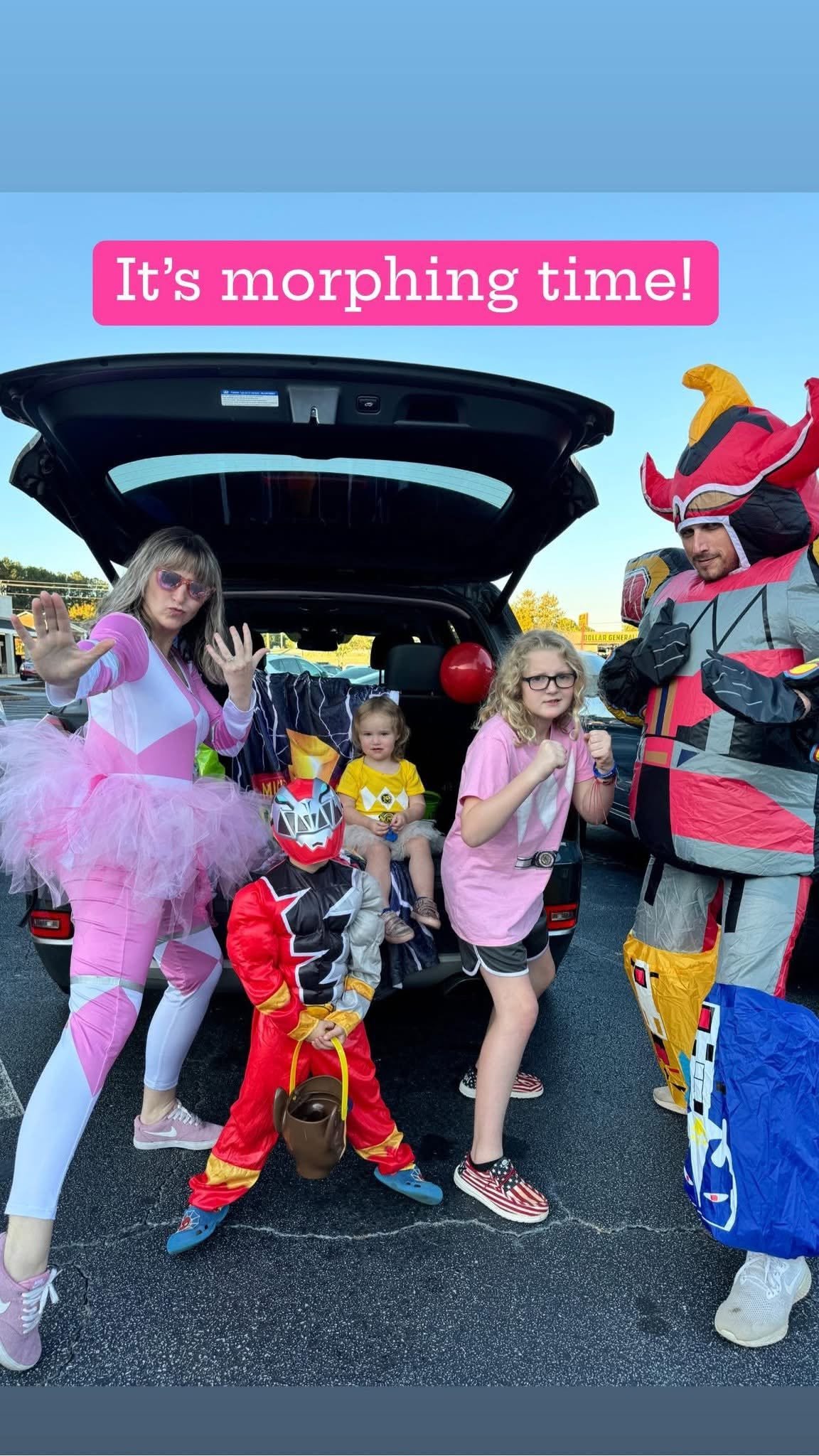 Family dressed in Halloween costumes